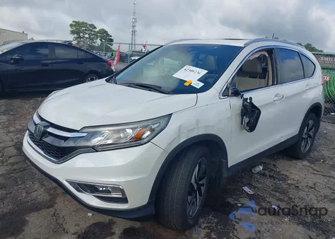 2015 Honda Cr-V Touring z USA, uszkodzony, nr VIN 5J6RM3H95FL025882